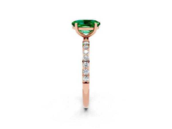 Rose gold Oval Cut Emerald Solitaire Ring with Round Pavé Shoulders and Prong Setting