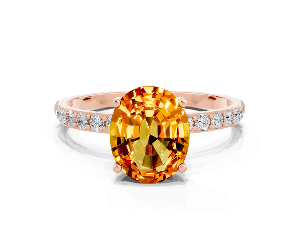 Rose gold Oval Cut Citrine Solitaire Ring with Round Pavé Shoulders and Prong Setting