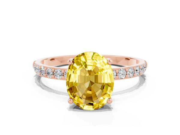 Rose gold Oval Cut Yellow Sapphire Solitaire Ring with Round Pavé Shoulders and Prong Setting