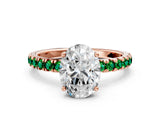 Rose gold Oval Cut Diamond Pave Band Solitaire Ring with Round with Emerald side stone and Prong Setting