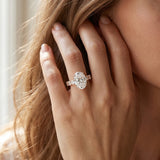 Rose gold Oval Cut Diamond Prong Setting with Side Stones on a Pave Band_15