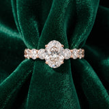 Rose gold Oval Cut Diamond Prong Setting with Side Stones on a Pave Band_16