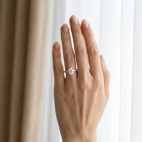 Rose gold Oval Cut Diamond Ring with Marquise Side Stones and Prong Setting