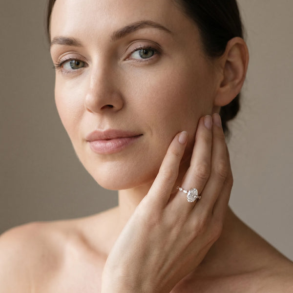 Rose gold Oval Cut Diamond Ring with Marquise Side Stones and Prong Setting