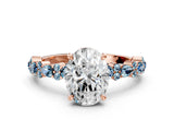 Rose gold Oval Cut Diamond Side Stone Solitaire Ring with Round with Aquamarine side stone and Four-Prong Setting