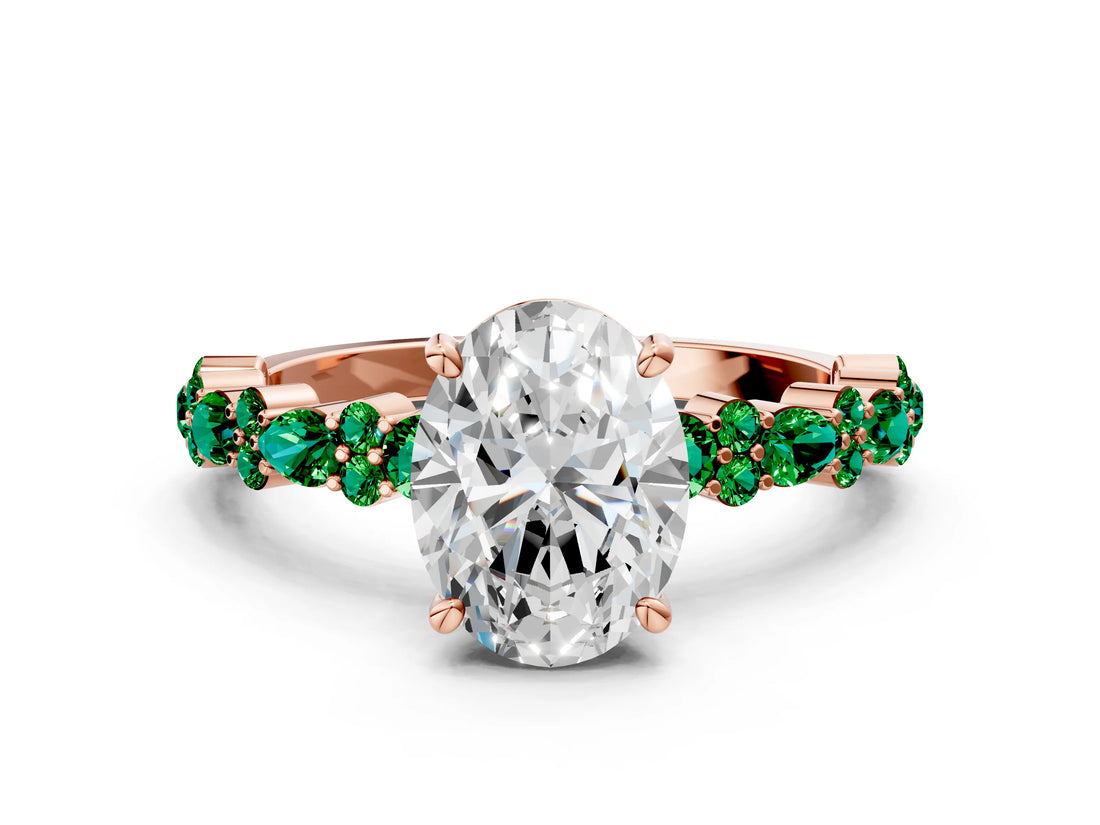 Rose gold Oval Cut Diamond Side Stone Solitaire Ring with Round with Emerald side stone and Four-Prong Setting