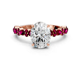 Rose gold Oval Cut Diamond Side Stone Solitaire Ring with Round with Garnet side stone and Four-Prong Setting