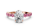 Rose gold Oval Cut Diamond Side Stone Solitaire Ring with Round with Pink Sapphire side stone and Four-Prong Setting