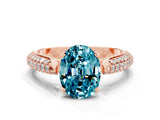 Rose gold Oval Cut Diamond Solitaire Engagement Ring with Pavé Band and Four-Prong Setting