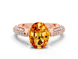 Rose gold Oval Cut Diamond Solitaire Engagement Ring with Pavé Band and Four-Prong Setting