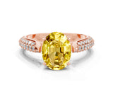 Rose gold Oval Cut Diamond Solitaire Engagement Ring with Pavé Band and Four-Prong Setting