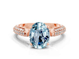 Rose gold Oval Cut Diamond Solitaire Engagement Ring with Pavé Band and Four-Prong Setting