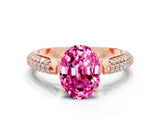 Rose gold Oval Cut Diamond Solitaire Engagement Ring with Pavé Band and Four-Prong Setting