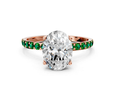 Rose gold Oval Cut Diamond Solitaire Engagement Ring with Round with Emerald side stone Pavé Band and Prong Setting
