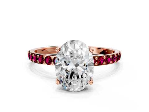 Rose gold Oval Cut Diamond Solitaire Engagement Ring with Round with Garnet side stone Pavé Band and Prong Setting