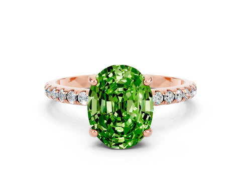 Rose gold Oval Cut Diamond Solitaire Ring with Four-Prong Setting and Pavé Band