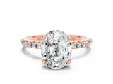 Rose gold Oval Cut Diamond Solitaire Ring with Four-Prong Setting and Pavé Band