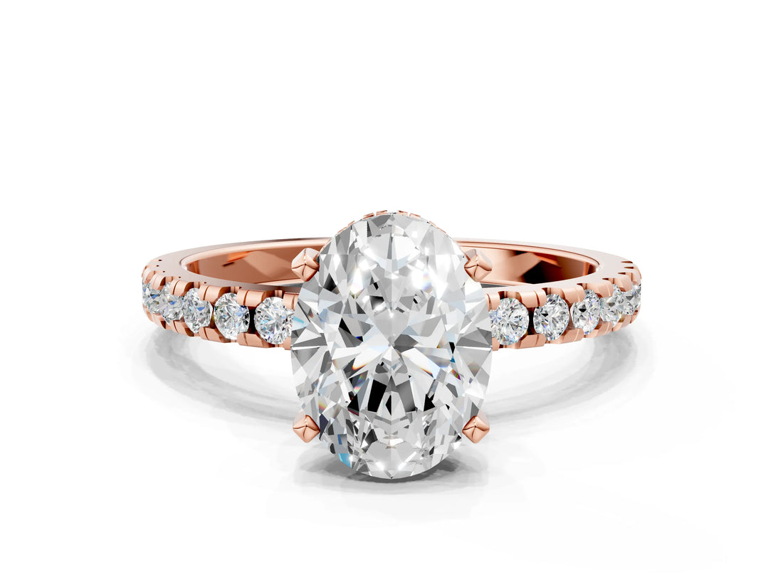 Rose gold Oval Cut Diamond Solitaire Ring with Pavé Band and Four-Prong Setting