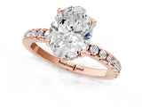 Rose gold Oval Cut Diamond Solitaire Ring with Pavé Band and Four-Prong Setting_1