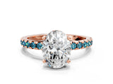 Rose gold Oval Cut Diamond Solitaire Ring with Pavé Band and Four-Prong Setting