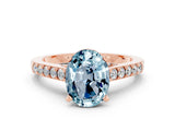 Rose gold Oval Cut Diamond Solitaire Ring with Pavé Band and Prong Setting