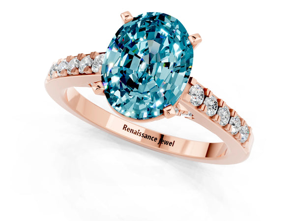 Rose gold Oval Cut Blue Topaz Solitaire Ring with Crossover Gallery and Round  Pavé Band