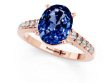 Rose gold Oval Cut Diamond Solitaire Ring with Pavé Band and Prong Setting_1