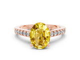 Rose gold Oval Cut Diamond Solitaire Ring with Pavé Band and Prong Setting