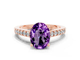 Rose gold Oval Cut Diamond Solitaire Ring with Pavé Band and Prong Setting