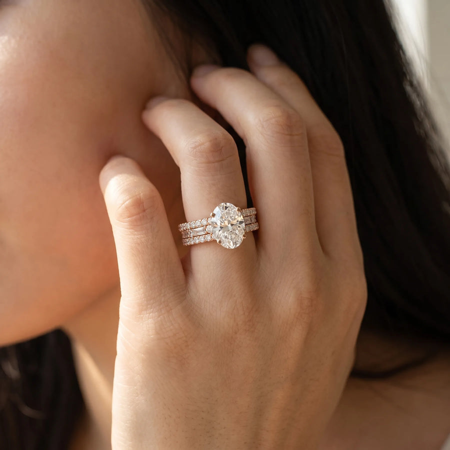 Rose gold Oval Cut Diamond Solitaire Ring with Pavé and Channel Set Band