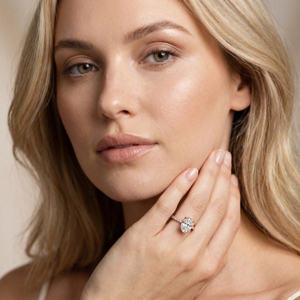 Rose Gold Oval Solitaire Engagement Ring Setting with Pave Accents and Open Basket