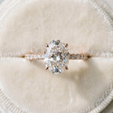 Rose gold Oval Cut Diamond Solitaire Ring with Round  Pavé Band and Prong Setting_308