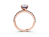 Rose gold Oval Cut Diamond Solitaire Ring with Round with Blue Sapphire side stone Pavé Band and Four-Prong Setting_39