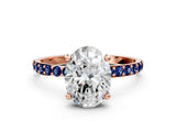 Rose gold Oval Cut Diamond Solitaire Ring with Round with Blue Sapphire side stone Pavé Band and Prong Setting_12