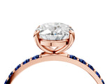 Rose gold Oval Cut Diamond Solitaire Ring with Round with Blue Sapphire side stone Pavé Band and Prong Setting_16