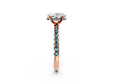 Rose gold Oval Cut Diamond Solitaire Ring with Round with Blue Topaz side stone Pavé Band and Four-Prong Setting_38