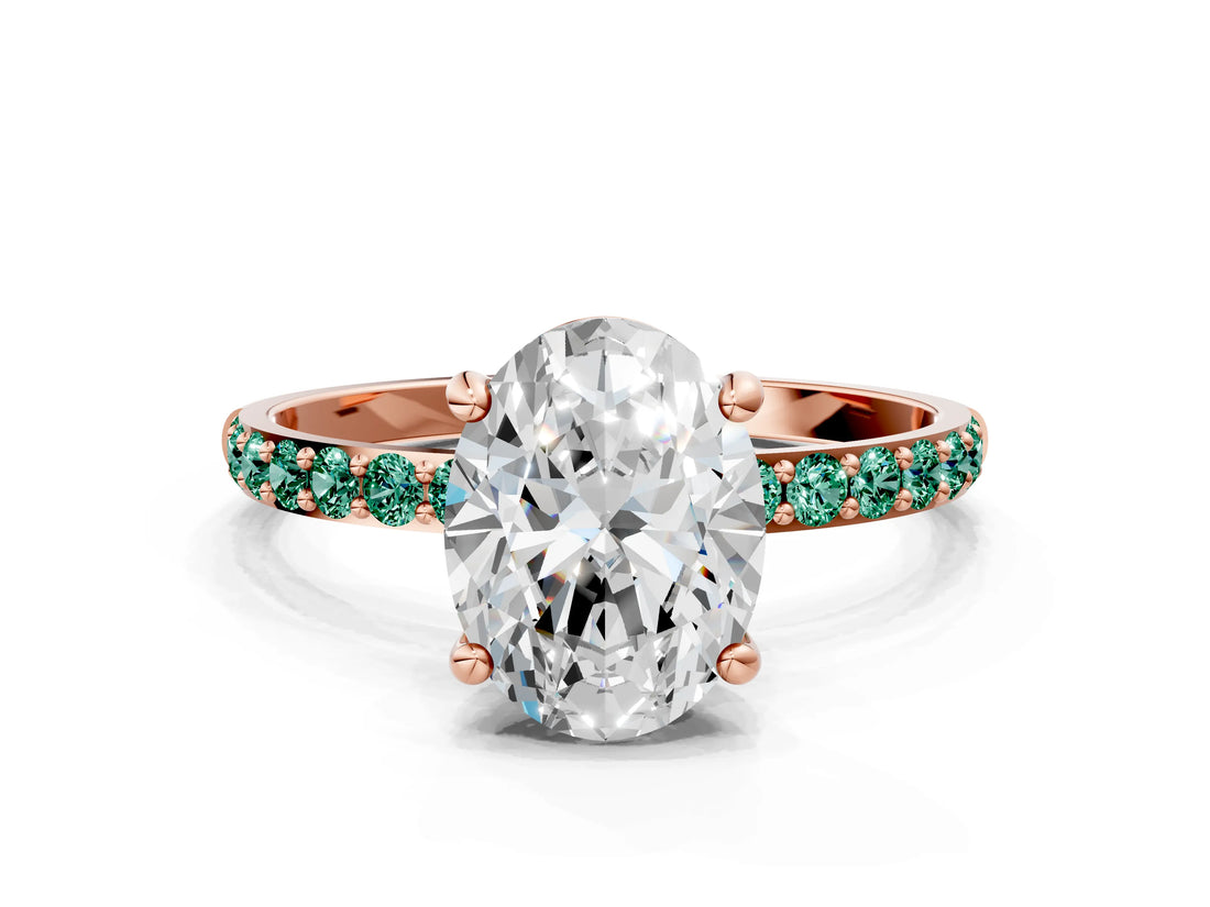 Rose gold Oval Cut Diamond Solitaire Ring with Round with Green Sapphire side stone Pavé Band and Prong Setting