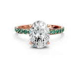 Rose gold Oval Cut Diamond Solitaire Ring with Round with Green Sapphire side stone Pavé Band and Prong Setting