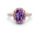 Rose gold Oval Cut Diamond Solitaire Ring with Shared Prong Pavé Band