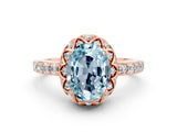 Rose gold Oval Cut Diamond Solitaire Ring with Shared Prong Pavé Band