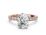 Rose gold Oval Cut Diamond Solitaire with Pave Band and Four-Prong Setting