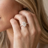 Rose gold Oval Cut Diamond Solitaire with Side Baguettes and Channel Set Band_15