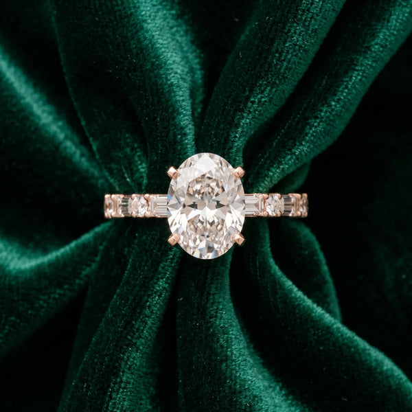 Rose gold Oval Cut Diamond Solitaire with Side Baguettes and Channel Set Band