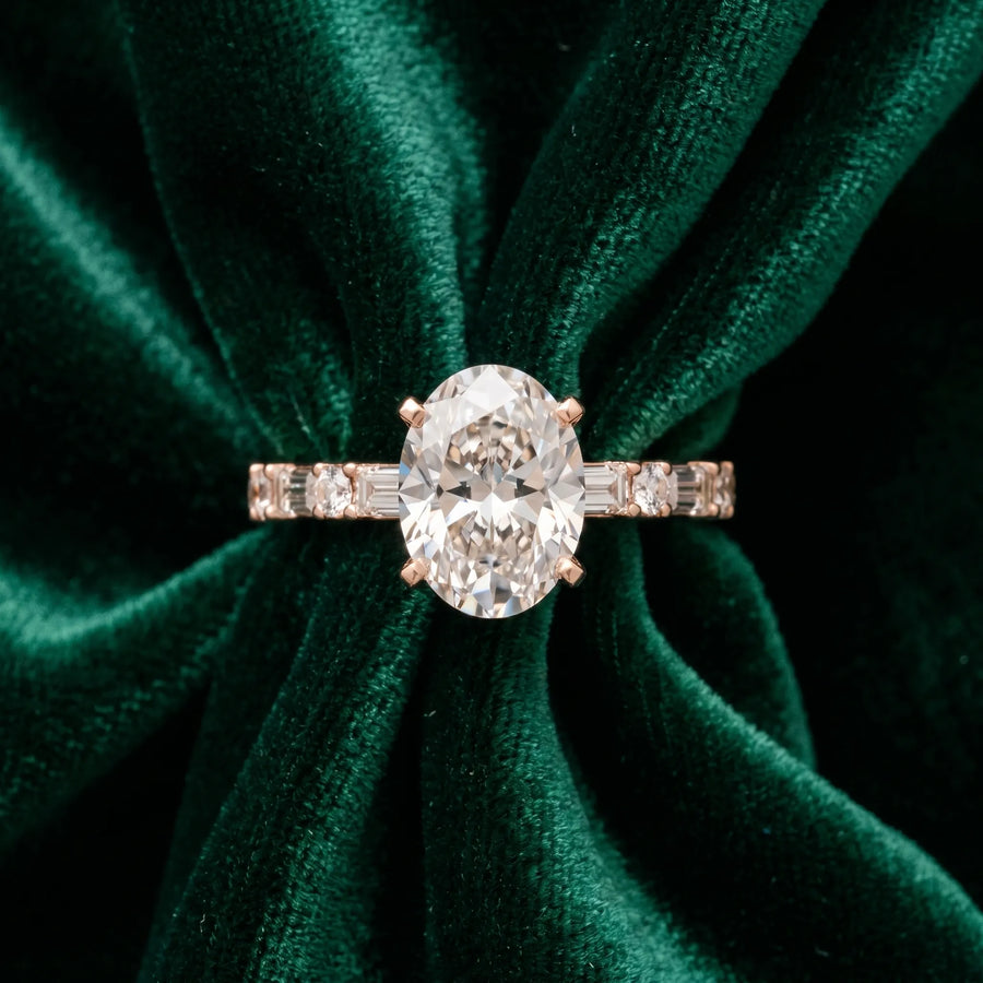 Rose gold Oval Cut Diamond Solitaire with Side Baguettes and Channel Set Band