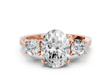 Rose gold Oval Cut Diamond Three-Stone Engagement Ring with Prong Setting and Pavé Band_3