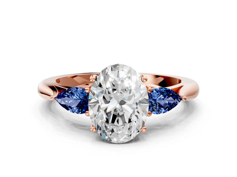 Rose gold Oval Cut Diamond Three-Stone Ring with Pear with Blue Sapphire side stone Side Stones and Prong Setting
