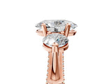 Rose gold Oval Cut Diamond Three-Stone Ring with Prong Setting and Pavé Band_8