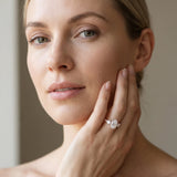Rose gold Oval Cut Diamond Three-Stone Ring with Round Side Stones and Pavé Band_103