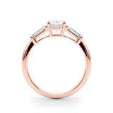 Rose gold Oval Cut Diamond Three-Stone Ring with Tapered Baguette Side Stones and Prong Setting 2