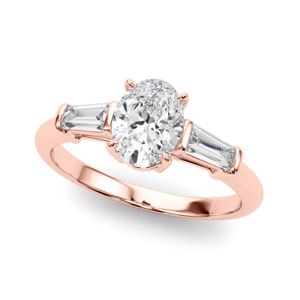 Rose gold Oval Cut Diamond Three-Stone Ring with Tapered Baguette Side Stones and Prong Setting